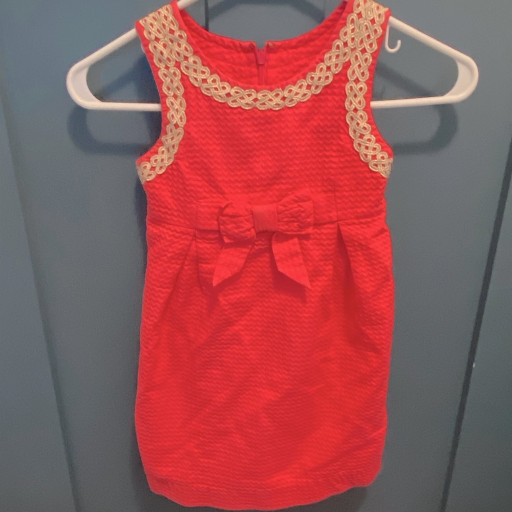 Lily pink dress with embellished collar.